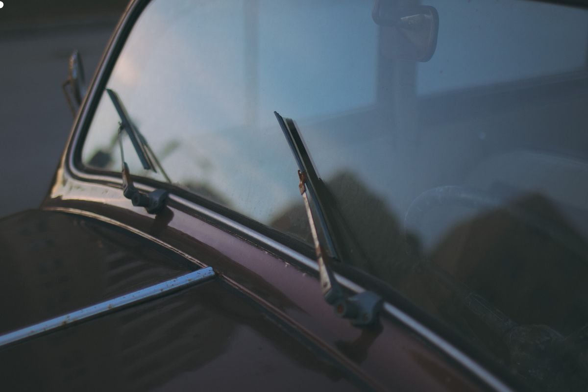 A selection of top-rated car window cleaning products displayed on a clean surface, showcasing their effectiveness and quality.